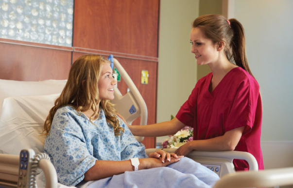 girl and nurse talking