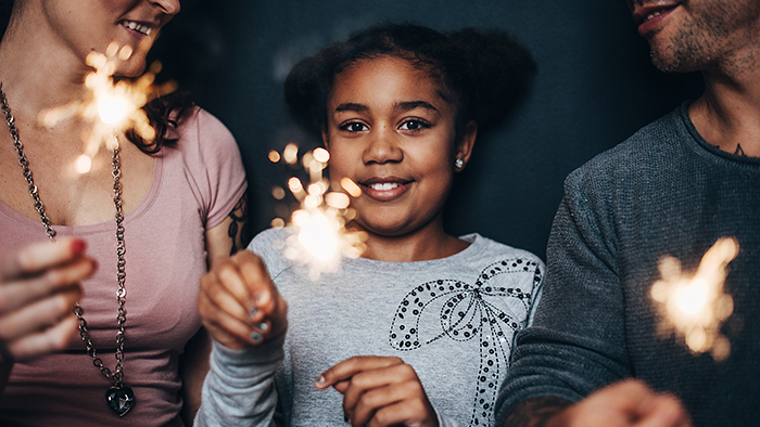 A young girl with a sparkler