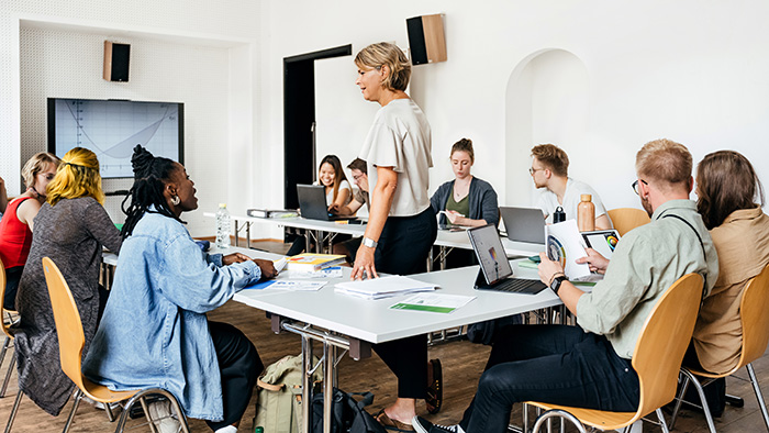 woman holding insulin pump