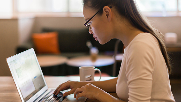 Female working at laptop computer