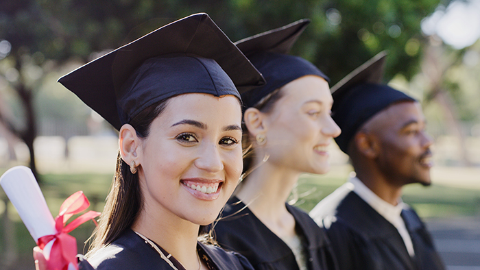 Students in graduation hats and gowns