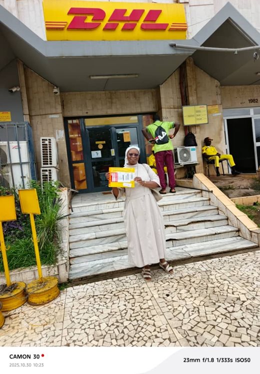 Nun holding envelope