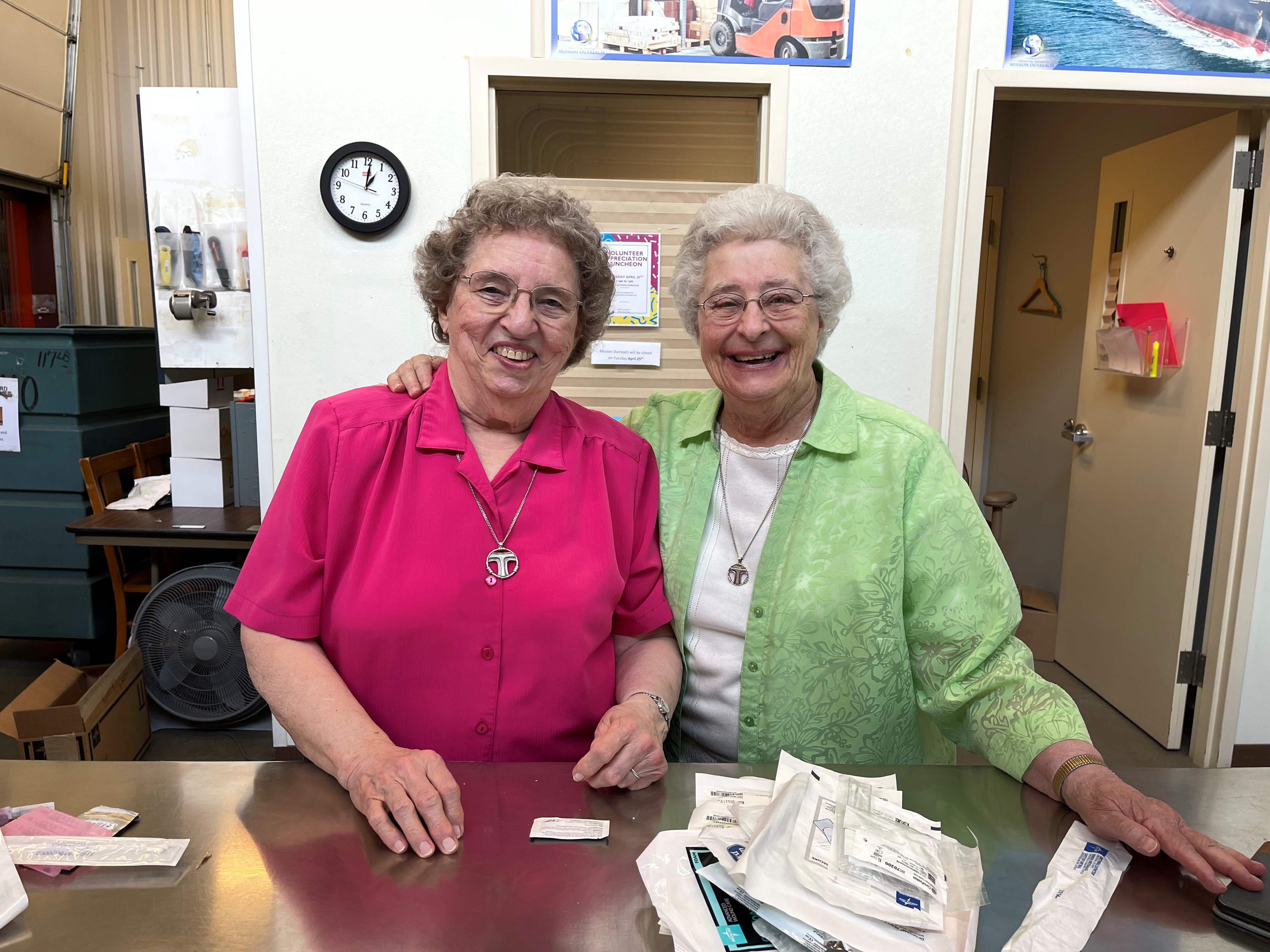Two Women Volunteering