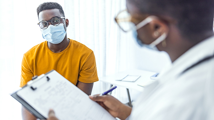 Young man with physician