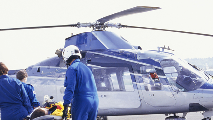 Patient being loaded onto helicopter
