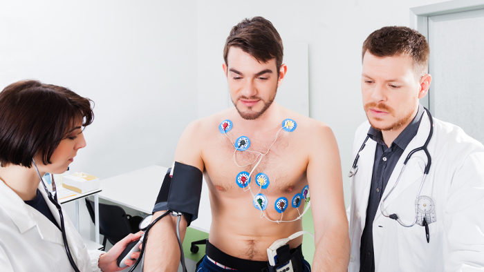 Man on treadmill hooked up with leads