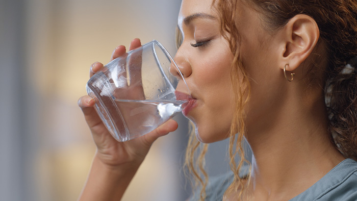 woman drinking water