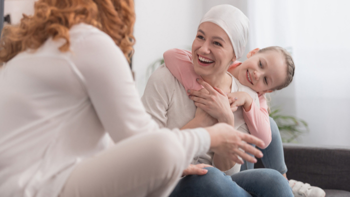 Woman cancer patient with friends