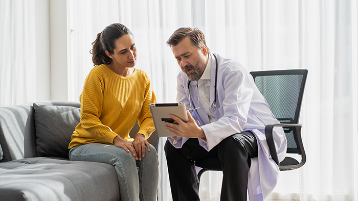 doctor talking with patient