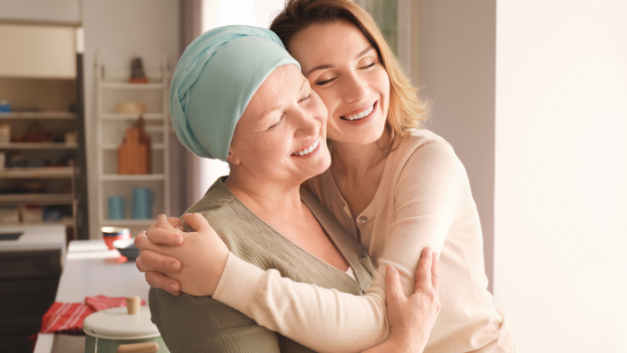 Two women hugging