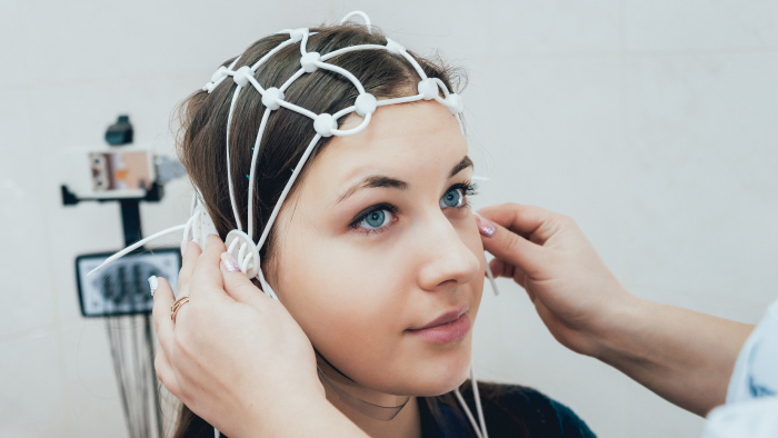 Young female patient setting up for EEG