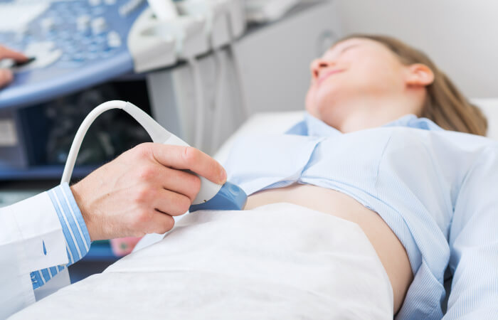 Young woman receiving an ultrasound exam