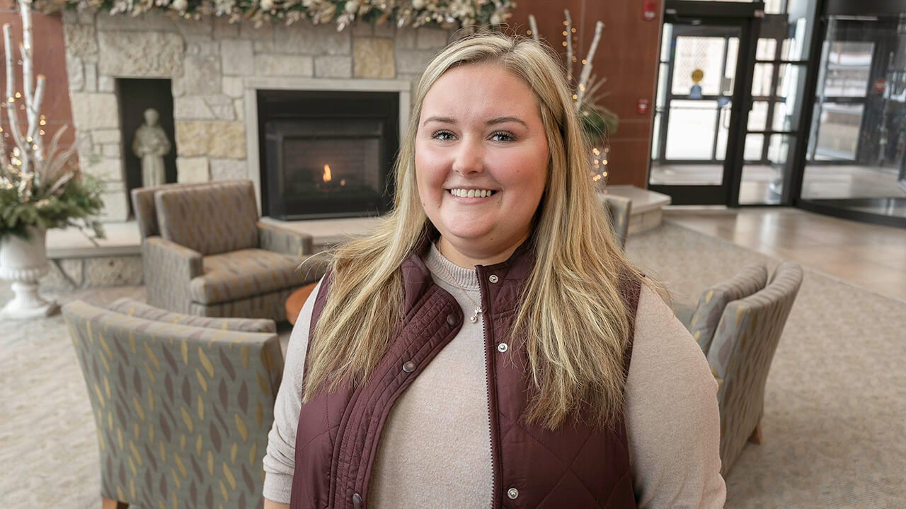 Patient Courtney smiling at the camera