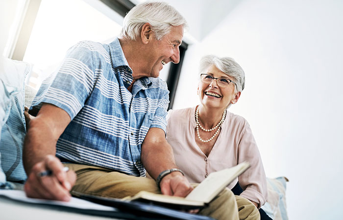 Older couple reviewing insurance plans