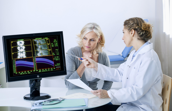 Services St Anthony Patient and Doctor discuss Imaging