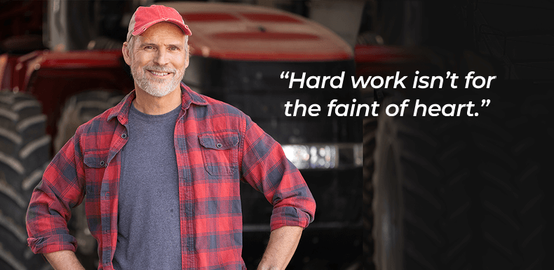 Smiling man in a red cap and plaid shirt standing in front of large tractor with the text ‘Your Heart is in the Right Place’ and the quote ‘Hard work isn’t for the faint of heart.’