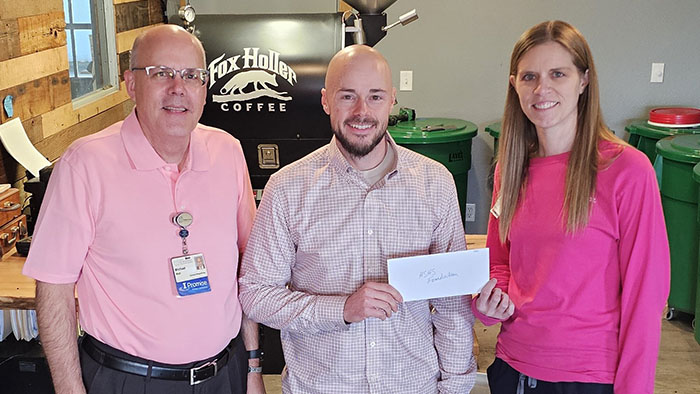 Fox Holler Coffer presenting donation