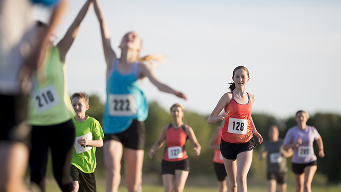 People of all ages running in a 5K walk/run