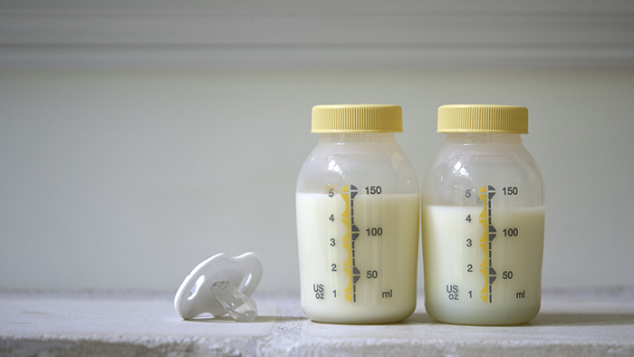 2 bottles of pumped breast milk