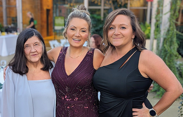 Image of Peggy and her daughters