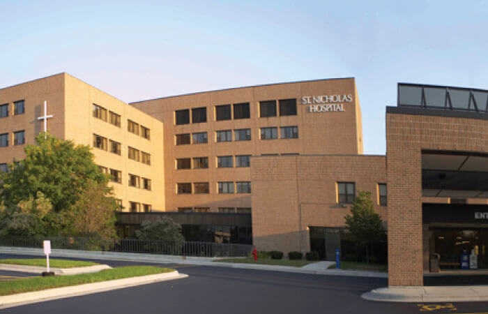 Looking up at the exterior of HSHS St. Vincent Hospital