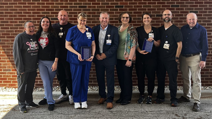 Tammy Sentel, RN, Emergency Department (fourth from left) and Abby Russel, RN, Med/Surg Unit, Preceptor of the Year (fourth from right)