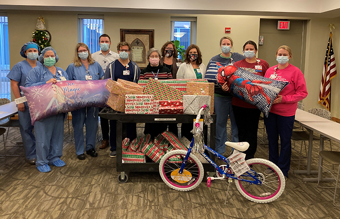 Colleagues adopt twelve families for Christmas