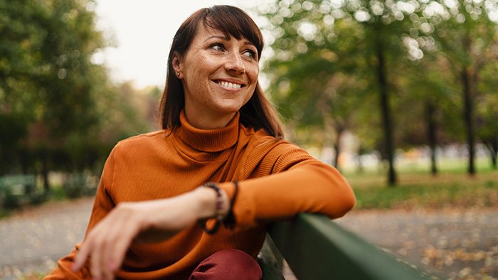 woman sitting on bench