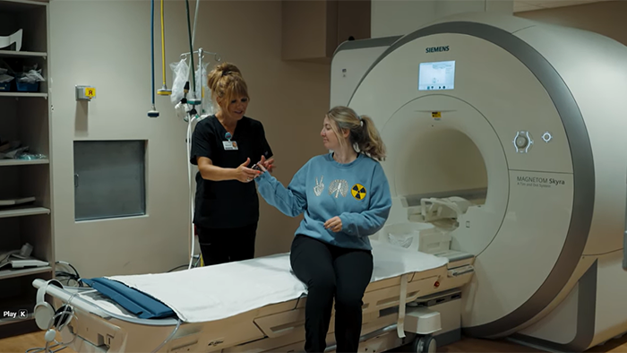 radiologist talking with patient