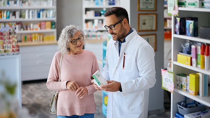 pharmacist talking with customer