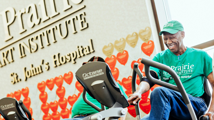 Man working out on recumbent bike