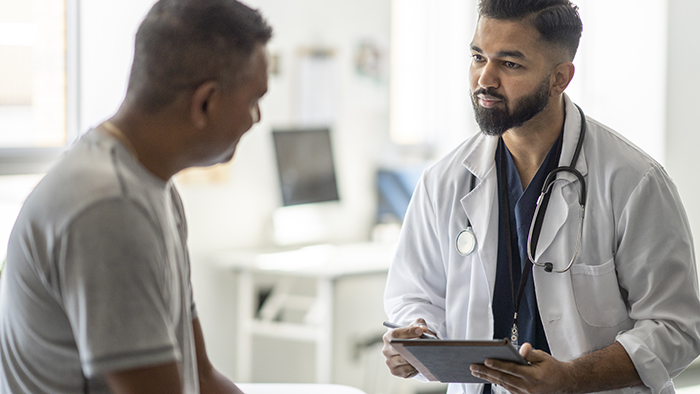 doctor talking with patient