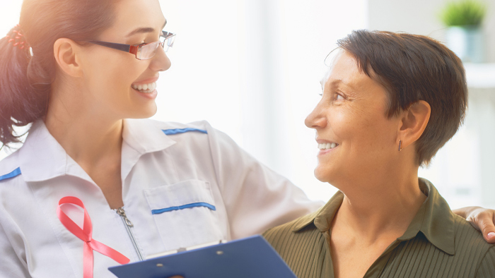 Female doctor consulting with a female patient