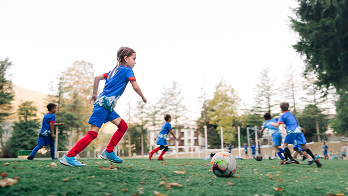 children playing soccer