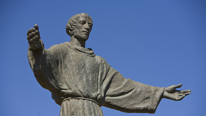 St. Francis statue with outstretched arms