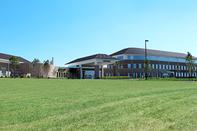 Looking up at the exterior of HSHS St. Joseph's Hospitla Highland 