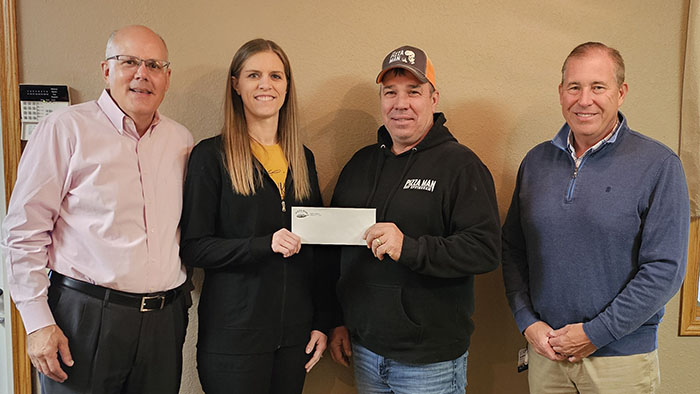 Pizza Man presenting donation