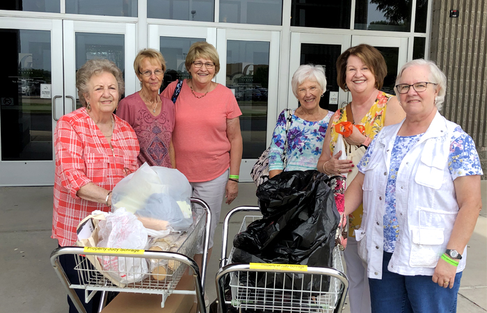 Group of female volunteers standing outside the hospital
