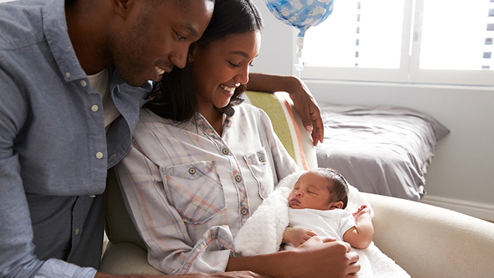 Dad and mom with new infant