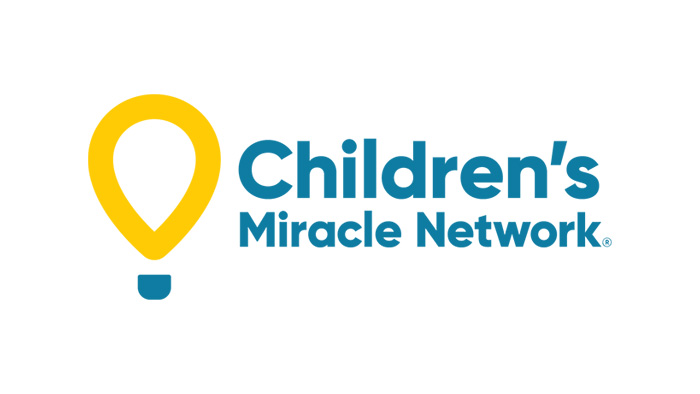 Three young girls with arms around each other