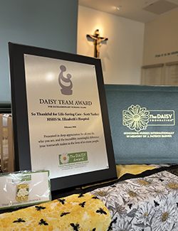 Daisy team award plaque.