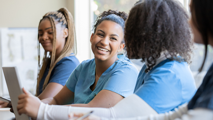 Nursing students at desk