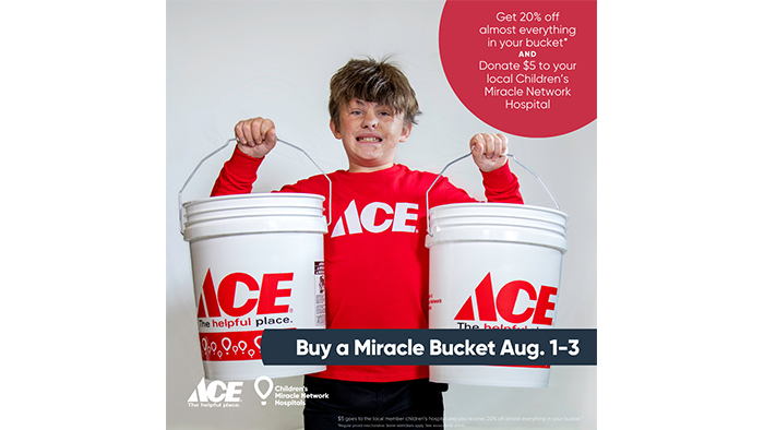 child holding ace hardware buckets