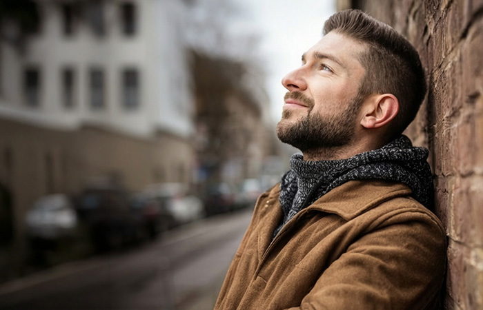 man looking up into the sky