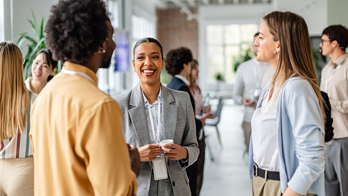 Diverse business professionals networking at an event