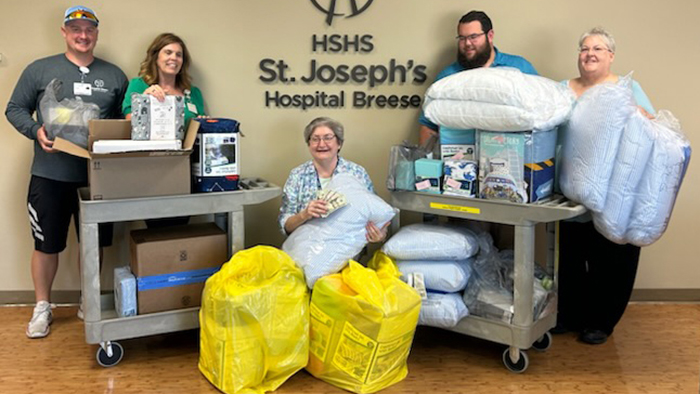 Colleagues collect bedding for mission activity